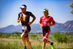 Boulder, CO -- June 11, 2016: Joe Gambles (left) battles with Sam Appleton (right) on the first lap of the run at the IRONMAN 70.3 Boulder. Gambles went on to win in 3:41:37 while Appleton took third in 3:44:00.