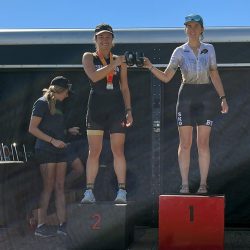 Image of the 2022 Boulder Sunset Triathlon podium for the collegiate women's sprint division