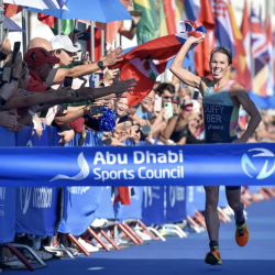 Flora Duffy crosses the finish line in Abu Dhabi