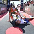 Jason West collapses near a lying Léo Bergère after they've both crossed the finish line.